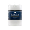 A 5-gallon tub labeled GLEAM Scale, Hard Water & Mineral Deposit Obliterator, primarily white in color with blue and black text. 